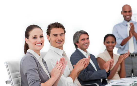 Confident business people clapping a good presentation